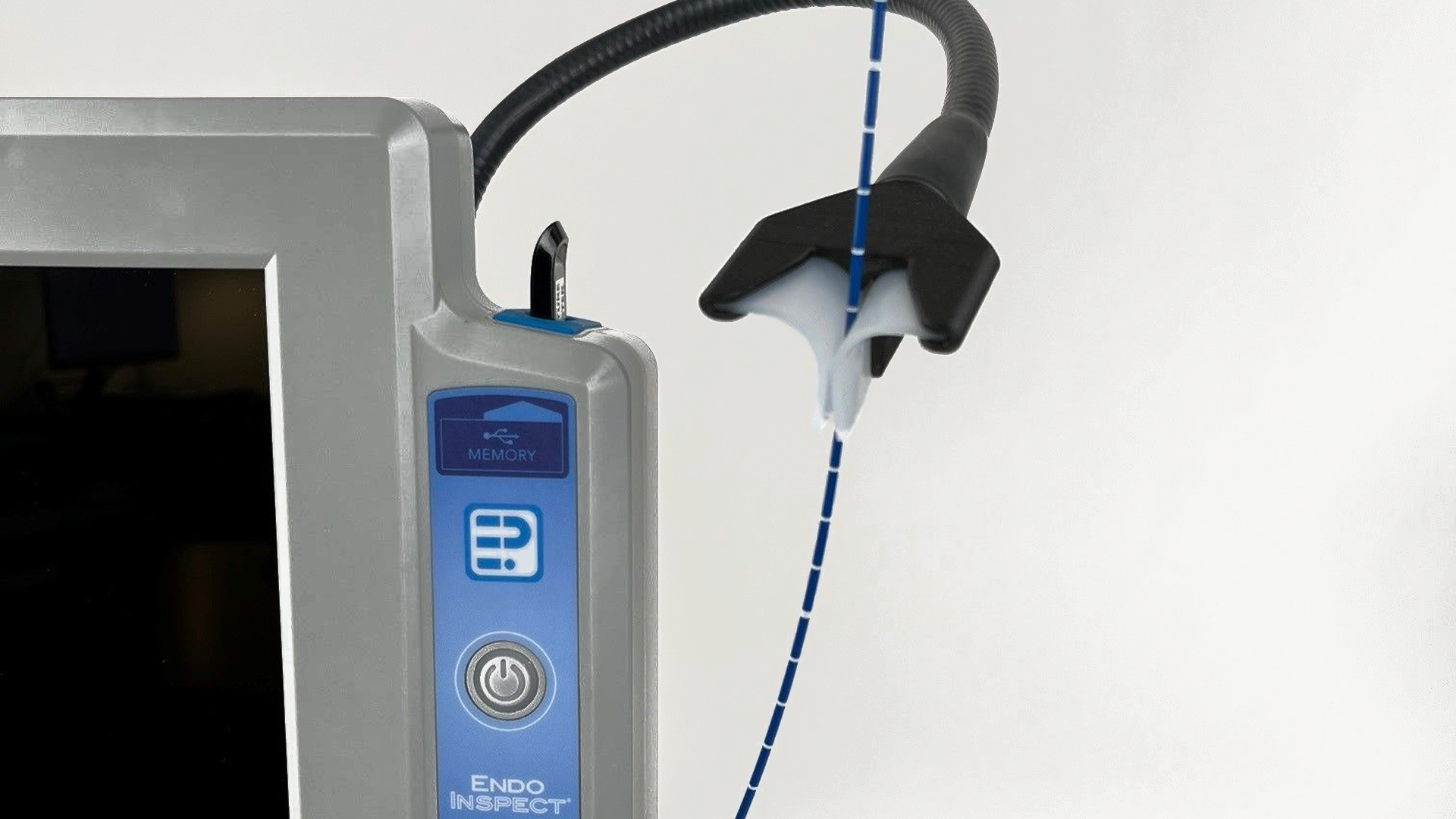 A wire holder connected to gray monitor